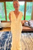 Beautiful Dress! I ordered 3 dresses to try for my beach wedding in the fall. This was not my final choice, but was beautiful. Unfortunately, I feel my measurements fall right between a medium and large for this dress, so it did fit a little loose. I would still consider the fit "true to size". As with all the dresses I purchased, the materials are top quality, but do not give at all in terms of stretch. I ended up choosing a different dress for my big day, one that I could wear a regular bra with. But I cannot recommend Lulus enough! - Anika P.