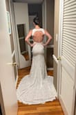I absolutely loved the top of this dress and wanted to love the rest. The bottom was too snug and the front slit was awkward. I wish it had a little stretch, and I would have been sold. Such cute detail on the top! - Caitlin N.