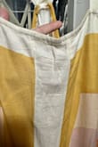 It's lovely. The fabric is fresh and light, the colors are different and warm. I love . - Lili Q.