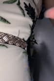 I wanted to love this dress but the quality was just not there. There were loose strings all of the embroidery, the straps were very large and one did not feel very secured to the dress but the hip/waist was very tight. - Kacelyn N.