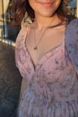 Absolutely beautiful! It runs large on the breast cups. I bought it for my daughter and she just loved it. We used a double-sided tape to keep the cup down so you couldn't see into it from the side. She also wore a padded bra. Otherwise, the dress was very comfortable. - Vanessa T.