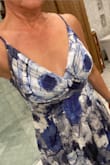 The dress was very pretty, loved the colors, and it fit very well. No bra needed. However.... the placement of the flowers made for a very... ummm... interesting effect.  LOL  I'm sure if I exchanged it for another one it would be fine, but I was in a time crunch. - Ashley A.