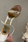 Bought these shoes last year for my engagement shoot. Never wore them again until last weekend for dinner and this is what happened. The bottom pad came write off forcing me to spend the night with this shoe on my foot. So disappointed don't waste your money because they do not hold up. - Zuleima C.