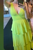 Love this dress! Got it for a party in Miami, and absolutely love it. It was slightly tight, and I had to enlist a friend to zip it up for me, but it was still comfortable after it was zipped up. It kept my boobs in place without a bra and is very comfortable. I loved the bright neon green for a Miami Beach party. - Melanie Y.