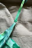 I liked the color but overall it was okay. The bust was gaping open and it did not fit my bust correctly. It also arrived snagged at the top of the zipper and at the halter, so I imagine that can happen easily when worn. - Elisabeth H.