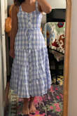 Its a great midi dress for summer. The fabric is a little thicker and good quality. Very comfortable, flattering and girly. - Ada T.