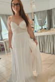 I love this dress for my reception. It's the perfect size and just stunning, yes [it's] see thru at the bottom so use nude undies! & I did no bra - Amanda C.