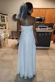 Very comfortable! I am short so I plan to hem but otherwise fit is very try to size! Versatile dress that I plan to transform into a halter by changing the way the straps tie! Also planning to add a pretty belt for a little something extra! - Janel R.