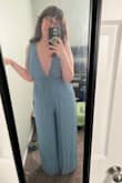 This jumpsuit feels high-quality. I am 5'8 and this is the first item of clothing I've ever purchased that is too long for me, I'll have to wear heels with it! I do have a smaller than average chest so the top is a bit large on me, but that's a me problem. I think the jumpsuit is proportioned well! - Kay M.
