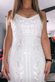 I ordered this dress last minute because I could not find one for my bridal shower! I normally wear medium but because it said no stretch I ordered large and honestly it fit great! It wasn't too tight! I probably could've fit in a medium but I like a little wiggle room! Everyone loved it and complimented my dress! It was perfect! - Kelly C.