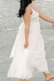 This dress is super pretty but it has sooo many layers & there's a lot of dress so it looks a bit puffy! Looked pretty for beach engagement pics but it made me look huge. - Ashlee W.