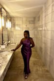 So, I wore this dress to my cousin's wedding. The color was so perfect, bold, and bright. I thought it would've been really long length-wise, but it was the perfect length and I'm 5'0 flat! I was pleasantly surprised. I love a one-shoulder dress because I can still wear a bra, but I chose to wear boob tape and it worked amazingly well. 

The only flaw was the bunching in the hem on the sides of the dress. I wish it didn't do that, but overall, I can definitely see myself wearing it again! - Antoinette T.