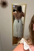Great fit. Needs an iron but is exactly the dress I was looking for for my bridal shower. - Megan P.