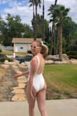 I loved this swimsuit because it was very comfortable, cute, and fit as expected. There's padding in the top part of the suit. Usually sleeves/open back of this style slide off my shoulders, but that was not the case at all for this swimsuit. It's also made from great material and is not see-through. - Haley H.