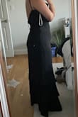 In other dresses on Lulus I fit into a large but this I definitely needed an XL! No stretch, but really pretty dress. - COURTNEY C.