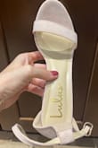 The shoes are beautiful but I needed light tan or nude-colored shoes for my dress and these are more of a soft pink/blush pink color. The ankle strap was a bit loose and I would have to make another hole in the strap to make it fit. Returned these and wore different shoes I bought elsewhere. - Lacey W.