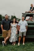 I wore this for family photos. It is true to size and very comfortable. I wore the sleeves on my shoulders for the photos but it's cute off-the-shoulder as well. - Kacie H.