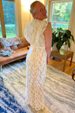 This is my dress! :) I kept being drawn to this dress my whole search, but waited to order because I was worried it was too "plain" for my beach wedding. But the simplicity of this classic style is exactly what made me choose it! I didn't want anything too thick or heavy, so the lack of train is perfect for me! I originally purchased this dress in a large which was a little too big, so I exchanged it for a medium. The fit is just about perfect, I thought about having it altered, but with my wedding just over a month away, I'm opting to just use fabric tape to hold the top in place and have the top lay flat to my chest. The return/exchange process was incredibly easy as well. I originally ordered 3 dresses to "Try at home" and all 3 dresses were stunning and great quality. I received my refund within 2 weeks of my initial purchase. I'm VERY pleased with my purchase and with Lulus in general! Highly, HIGHLY recommend! - Anika P.