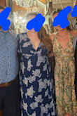 I wish I had better pictures but it was so comfortable and looked really nice with some shape wear. I wore heels as I am a bit short. I also added some double sided tape on my bra to keep it from being too low. - Maddie B.