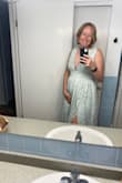 Bought this for a formal wedding in August when I will be 27 weeks pregnant. They didn't have my typical size large so I sized up to XL, thinking if anything it would give my baby bump extra room. I didn't really need the extra room as it is a little loose up top, but I'm glad I was able to get the dress because I'd been eyeing it for a while and waiting for my size!! It's very long and shorter people may have to have it hemmed (I won't need to because I'm wearing heels). I love the color, material, and fit of this dress. It seems like it could be worth double the price. So excited to wear it! - Elizabeth D.