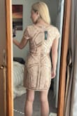 This dress looks even better in person than on the site. I wore this for a fancy dinner in Vegas for a company event and it stole the show. 

A few things to consider. I am 5'4 and it definitely shows some leg (even without heels), so if you're taller or prefer a more modest hemline, take that into consideration. I also couldn't lift my arms more than 90 degrees and I have a teeny upper body. I wouldn't go dancing in this.

I have some hips as well and it fit me perfectly. Well done Lulus. - Jessica D.