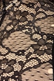 After waiting 3 weeks to go out to dinner, I wore this body suit one time and it fell apart and all the lace started frazzling and large holes ensued.  I wear minimal jewelry and definitely did not snag it on anything (I am 53). It is the quality of the item. I waited too long to wear unfortunately for a return. Spare yourself the money and DON'T BUY THIS ITEM. It is bad! These photos are of the garment not on me, but trust me the holes expand when it is on your body. I count 10 of them on the item. - KATYA K.