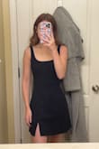 I needed a black dress that wasn't over the top and still in the dress code for the first day of my senior year in HS. This one fit pretty nicely and actually kinda did something for my little figure. The one thing that made me slightly uncomfortable was how low the top of the dress sat on me. Looking at the pictures it doesn't look that low, but I noticed it whenever I had it on. There are no adjustable straps, but if the straps were just a little shorter in length I think it would have been fine. Also, I don't know if you're really supposed to see the slit at all times, but the only time it is visible to me is when I put my leg out a little bit. Other than that, it's cute! - Julia C.