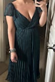I cried when I tried it on and it didn't fit as expected - with a medium it was great on my waist but the bust didn't offer the coverage I hoped for. As someone officiating a wedding in 3 days, and already went through a round of returns, I had paid to overnight this dress in confidence it would be the one. Now I'm out even more money and still don't know what I'm wearing to this wedding. (My fault for not preparing soon enough, but the disappointment is still so real). - Stephanie F.