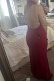 The material is great! It has stretch and it's flattering. I'm thin on the top and wider in my hips and the Small size fits me well. It was a bit long so I had to tailor it and trim off about an inch. - Deyanira C.