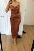 The dress fit really great and I loved the color on me but the wrap was so weird that the slit ended below the knee. Overall, it made me feel like a mummy. It was super cute otherwise. - Isabella P.