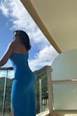 I am 5'9", 150 lbs. I ordered a Medium and it for perfectly. And it was long enough! 
The material has some give to it, so if you're worried that it'll be too tight&.don't!  I wore it for a wedding in Puerto Vallarta, MX. it was a hot day, the light material was a plus. - Valerie D.
