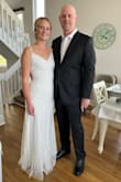 I bought this for my beach wedding in May and it was perfect. Very elegant and comfortable. The beading gave this dress an extra special touch. Size medium fits almost perfectly out of the box, but I did get it taken in at the waist a little bit. - Amy H.