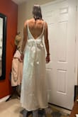 This is a very unique dress and I LOVED the pearls on the straps. It just unfortunately doesn't look flattering with my body type. I am 130 lbs and would probably size down - Nicole A.