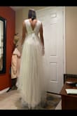 Very pretty bright white and delicate tulle create a great contrast together. I was not a fan of the tail but it was very comfortable and light. - Nicole A.