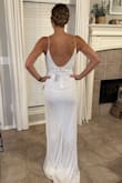 This dress was beautiful and fit very well. The beading was a little heavy. Amazing dress. - Ashley A.