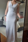 There were a lot of things I liked about this dress. I probably would have kept it except the lace in the back doesn't lay flat. I tried to include a picture of this. Otherwise, the material was nice and the cut was flattering. A size medium fits me very well. FYI, the fabric clings, so even in your correct size your silhouette will be obvious. The return process was super easy and I liked the dress enough that I might order some others from Lulus to try on. - Emilee E.
