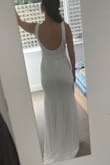 Ordered this dress along with a few others to find a wedding dress for next year. The lace overlay is really nice and the dress is nice and lightweight. I'll be getting it taken in a bit around the waist and shoulder straps but glad I went with a small, as it fits perfectly around my hips. The buttons in back need to be secured a bit so they don't all point different directions but that's an easy fix. Love the little train! - Shelby J.