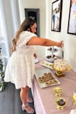 It fits like a glove & was perfect for my Bridgerton-themed bridal shower! It was so beautiful in person too & I got so many compliments! I was stressing so much and tried on so many dresses, and when I tried this one on I knew it was the one! I felt like a princess! - Melisa G.