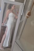 I'm wearing this dress to my reception, but I almost like it more than my ceremony dress. It's so lightweight and soft. I love the slit, it gives it a bit of a sexy edge but not too much. It is a bit long, so one or two-inch heels work perfectly. It zipped up perfectly but was a bit loose in the belly, so it might even work If you were a few months pregnant. Go for it! - Angela T.