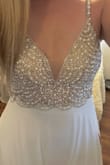 This dress is perfect! I first ordered a small and it was a tad too small, I then exchanged it for a medium and it fits perfect! Just very long so I will definitely need a hem. Looks like a $2,000 dress, so beautiful! Cant wait to get married on the beach in this dress! - Kailee C.