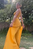 I have this in purple and now my favorite is yellow. It's so comfortable and perfect for an outdoor concert in the heat. Makes my bum look fabulous! - Sarah D.