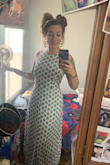 This dress fits true to size. I'm a 6, ordered a medium. Super comfortable, great quality, & don't have to wear a bra which is always a plus. It's extremely flattering & versatile when going from a summer day to evening. - Carissa K.