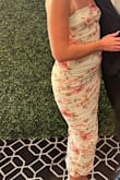 I received so many compliments on this dress. The print is so beautiful. The green is gorgeous as well. The material is very soft and stretchy. It is a very flattering dress. I liked I didn't have to worry about anything popping out. The straps are adjustable. Just so many great things about this dress!! - Lauren G.