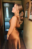 This dress was a stunner! It fit perfectly and the material was very comfortable, thick, and did not look cheap! I wore it the whole night as a wedding guest and received many compliments. My only concern was how deep cut the dress is which made dancing a little more of a challenge. All in all, I love this dress!!=<ü - Annie R.