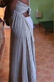 I bought this dress for a vacation trip. I normally wear a small but thought I'd give a medium a try so it would be flowy. I wore it for 3 hours when the elastic waistband just gave way and my [bottom] was hanging out. Now, I can't return it since I took the tags off to wear it. - Cheryl C.