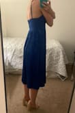 I love this dress! I wore it to a wedding and was comfortable all night. Thankfully the straps didn't loosen at all. I went back and forth on size based on the reviews, and I was happy I ended up going with an x-small because my rib cage is pretty small. I would have definitely needed the small otherwise. I didn't have the issue with the bunchy zipper as some people commented on, but I also don't "fill out" the back very well. - Madison K.