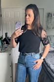 I loved! It's a very light fabric but made me feel warm, I don't know if is good to wear in summertime, but fits beautifully. 
It was just a little tight in my arms, but I like it, I have large arms anyway. When I wear it I always receive good compliments. - Emanuelle A.