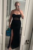 True to size and very flattering. The slit isn't too high and the dress was overall comfortable throughout the night. The boning did rub under my armpits and caused rub burns/sores but beauty is pain. I received lots of compliments. - Tara N.
