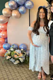 I got this dress for my baby shower and it was absolutely perfect for the event. It matched my invitations, was comfortable to wear all day, and while it is not meant to be a maternity dress, it works perfectly for me at 35 weeks pregnant. I wasn't quite sure what size to get as I normally wear a small or medium and many of the reviews mention how small it runs. I'm really pleased with my purchase of the Large size. I'm normally about 130 lbs and I think the medium would have been good for me if I were not pregnant. Right now I am 150 lbs, but pretty much all belly, so the sleeves fit well and weren't too tight as some others had mentioned. The chest was the right fit even with how much I've grown in that area as well. The skirt is in sectioned layers so it really is forgiving and flowy. I could have worn flats with this length but opted for heels and it was still a nice length and not too short. Very pleased with this purchase! - Milynn Z.