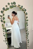 So I'm 5'7" with big hips and a small chest and the small size fits me perfectly. This is a beautiful dress but I will say, it's a little heavy. - Victoria B.
